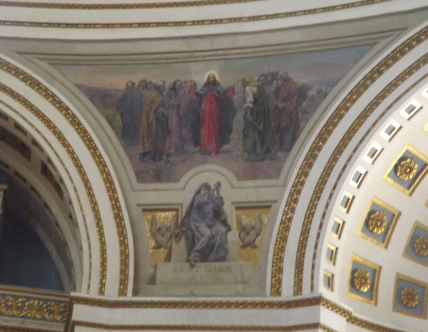 Painting by Giuseppe Cali of Christ and the Apostles above the entrance to the church which was hit by the bomb.