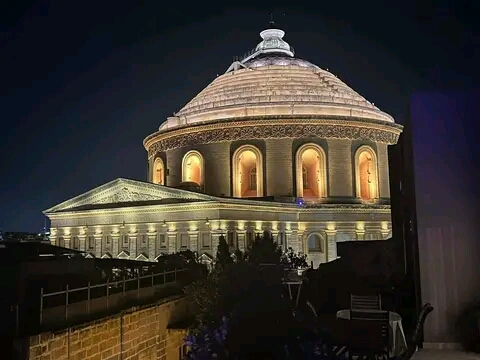 Mosta Rotunda back lit up with new design Luminaire